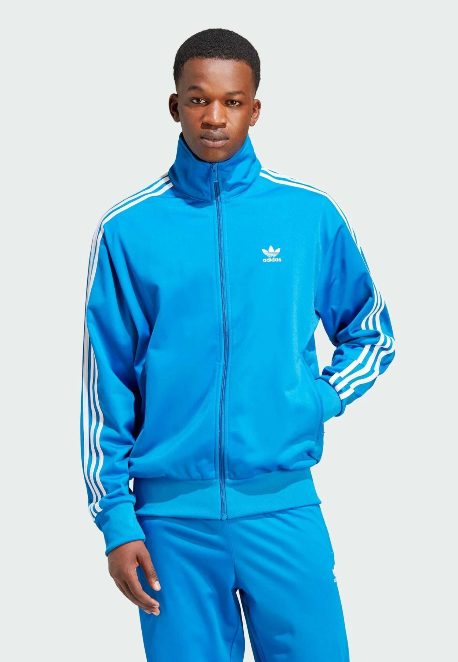 Adidas Originals Fbird TtGiacca SportivaBlue Bird White Uomo Pantaloni Sportivi E Joggers AD122T0DD-K12 1 Adidas Originals Fbird TtGiacca SportivaBlue Bird White Uomo Pantaloni Sportivi E Joggers AD122T0DD-K12