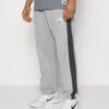 Nike Performance Starting Pantaloni SportiviLight Smoke Grey/Anthracite Uomo Pantaloni N1242E282-C11